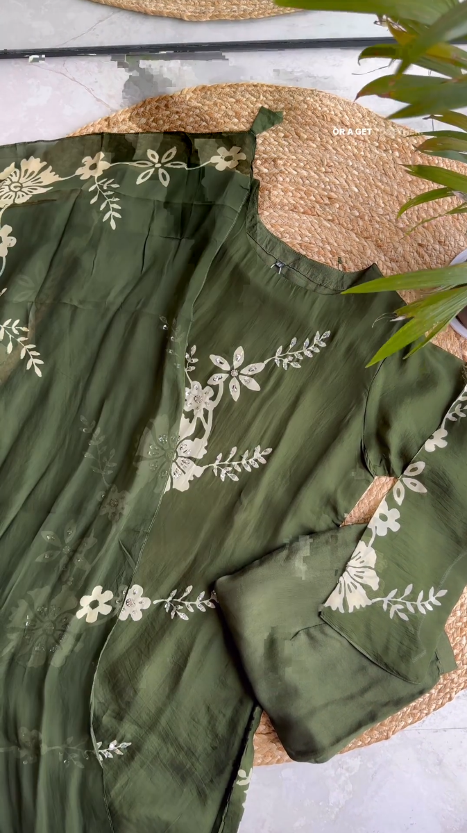 Blossom into Spring with Our Green Embroidered Top