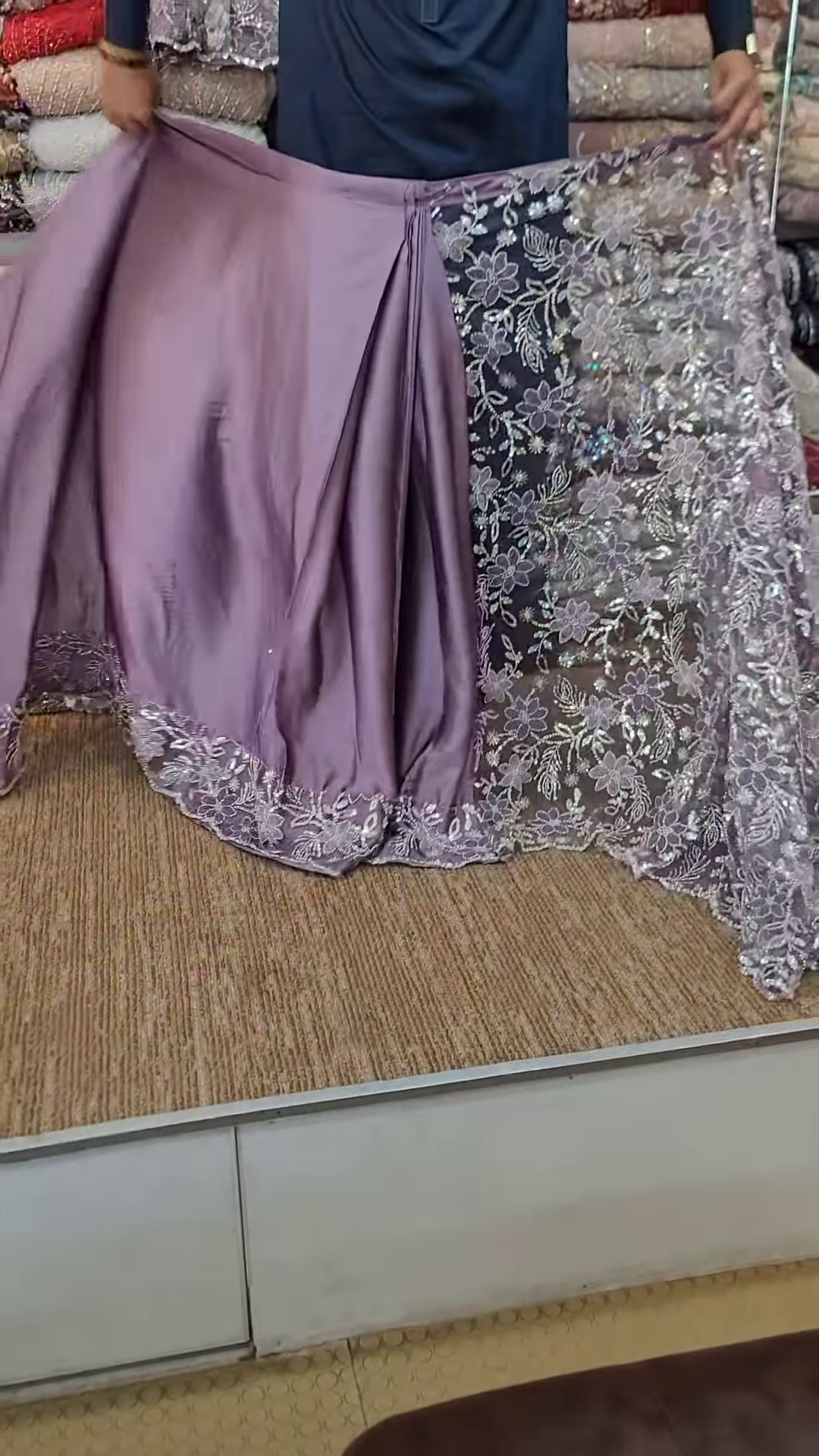 Elegant Purple Net Saree with Intricate Design