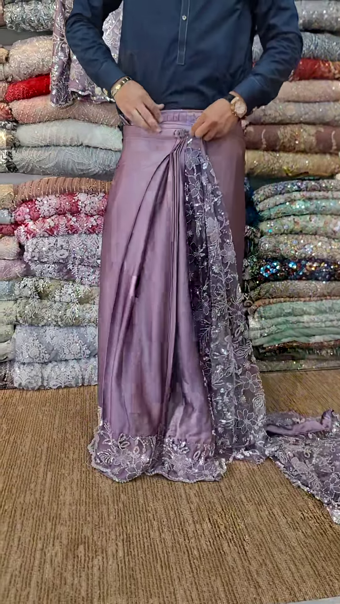 Elegant Purple Net Saree with Intricate Design