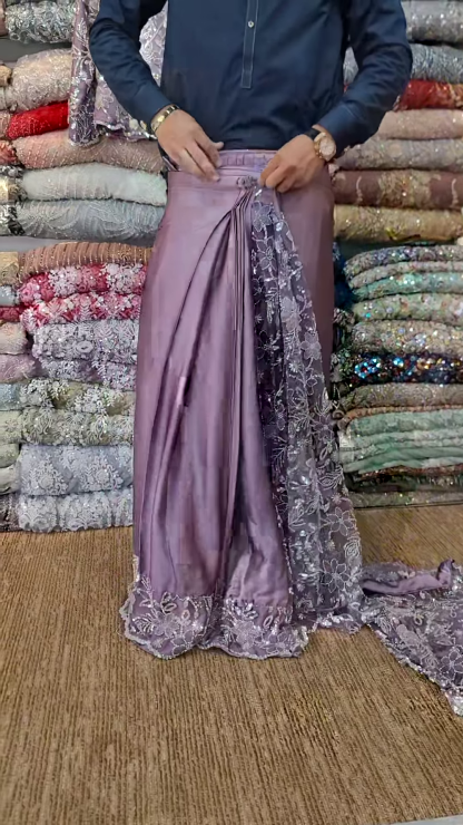 Elegant Purple Net Saree with Intricate Design