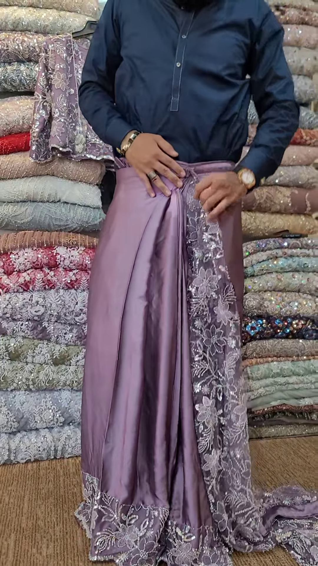 Elegant Purple Net Saree with Intricate Design