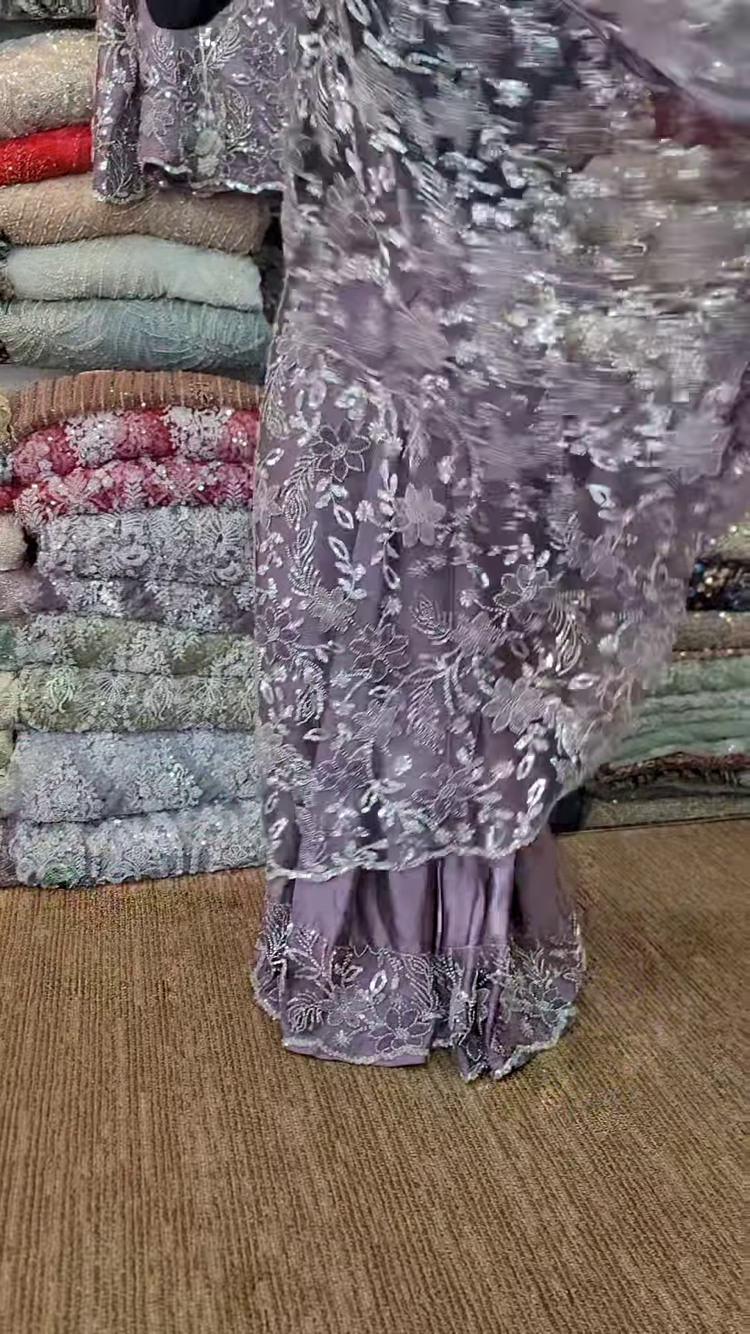 Elegant Purple Net Saree with Intricate Design