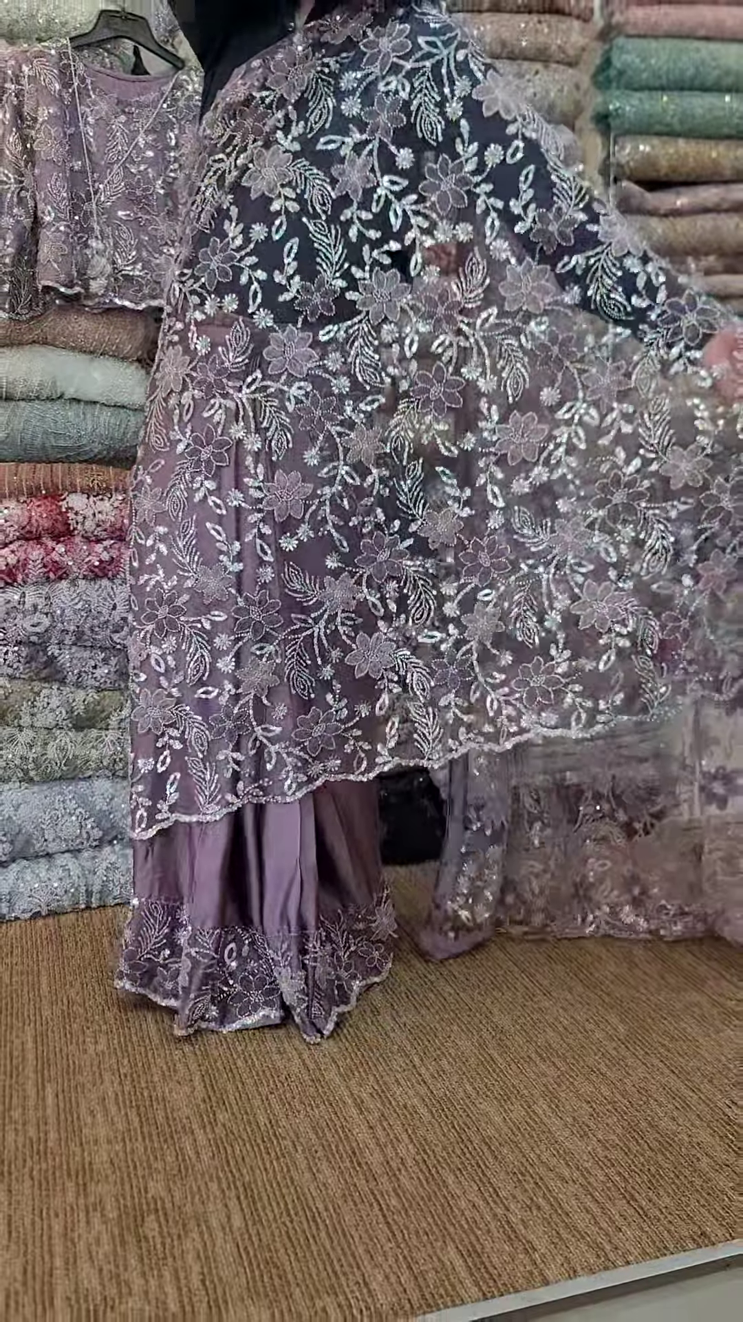 Elegant Purple Net Saree with Intricate Design
