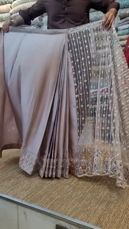 Elegant Chikku Net Saree with Intricate Design