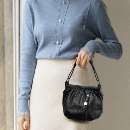Women's design sense leather bag