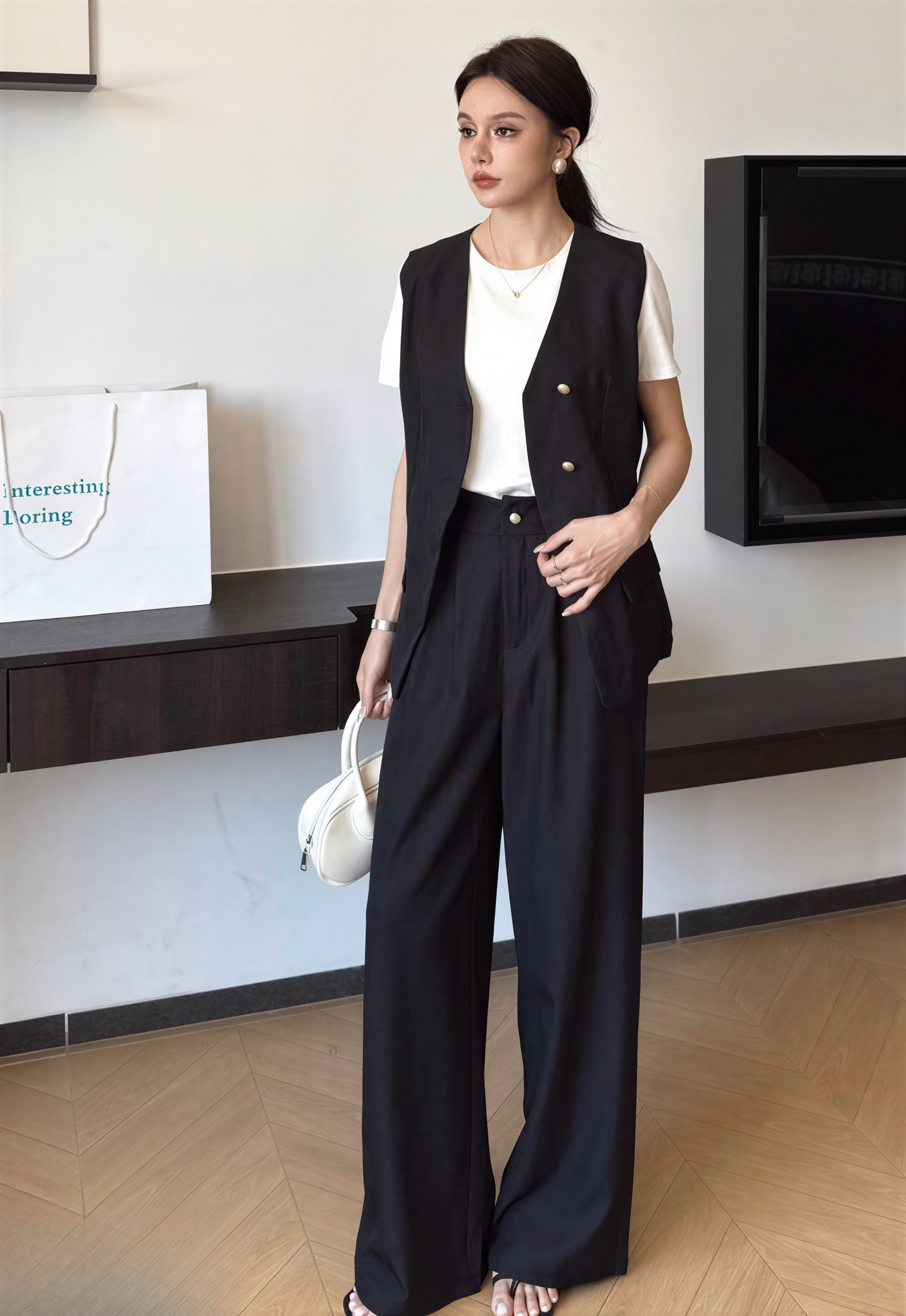 French-style diagonal buttoned vest and wide-leg pants set