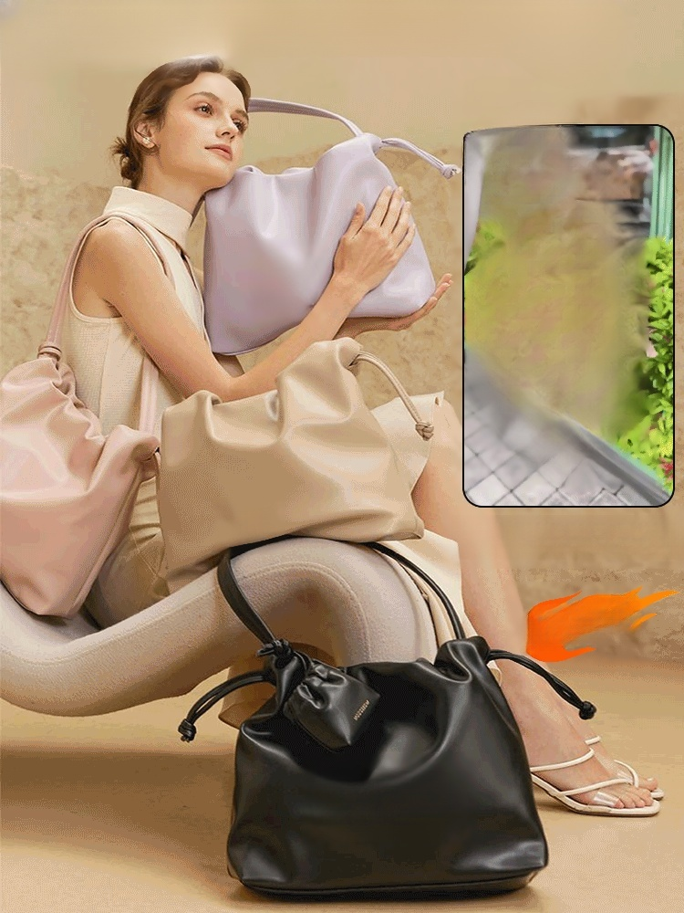 กระเป๋าใต้วงแขนความจุใหญ่