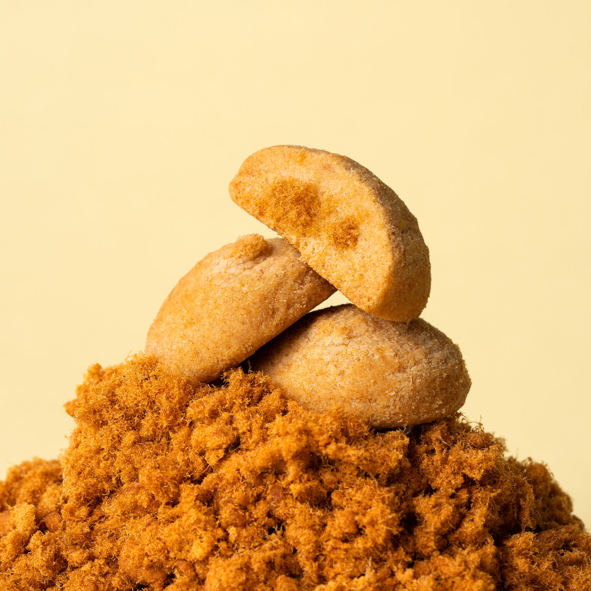 Pork floss filled cookies with a crisp golden exterior and savoury centre.