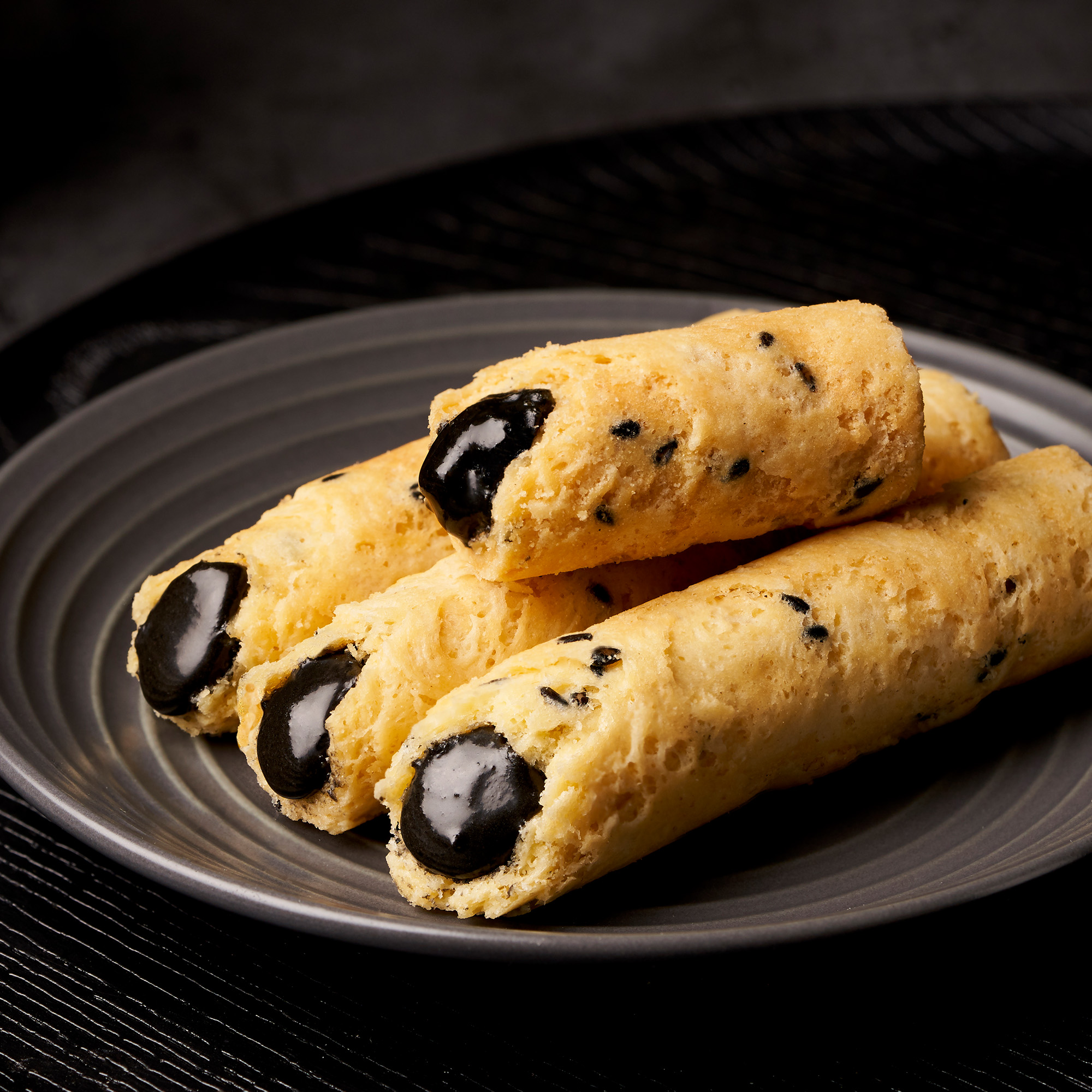Sesame Filled Egg Rolls with crispy buttery shell and smooth sesame filling