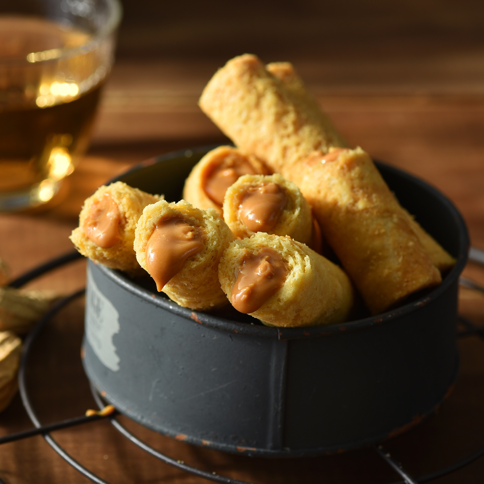 Peanut Filled Egg Rolls with crispy buttery shell and smooth peanut filling