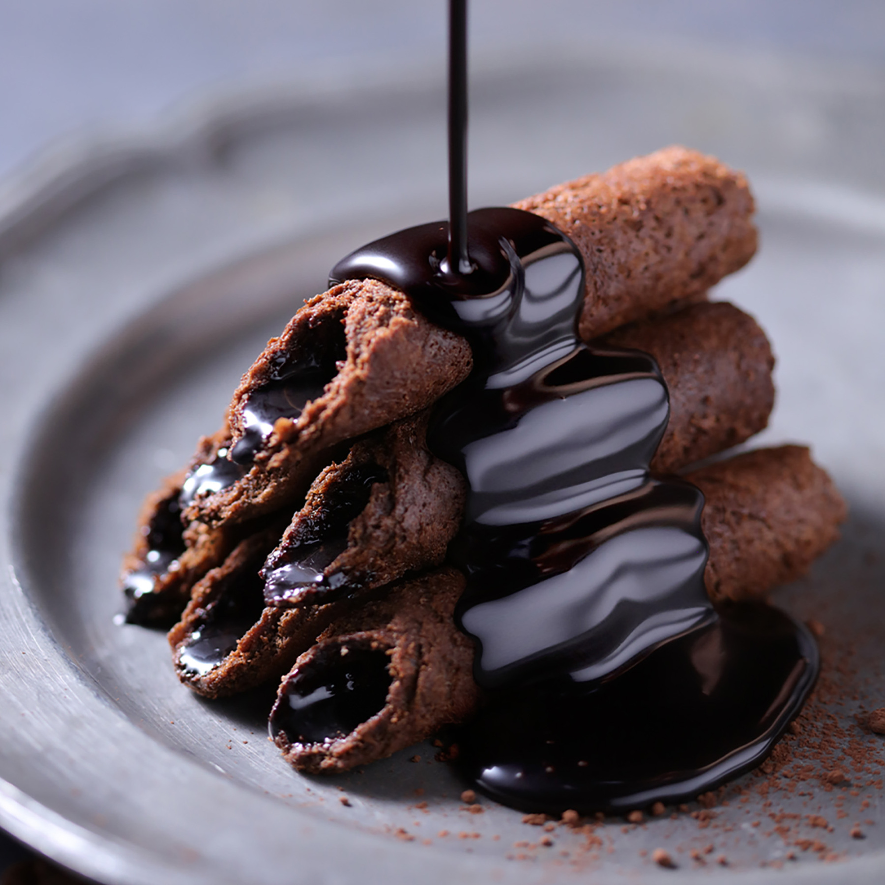 Dark Chocolate Filled Egg Rolls with crispy buttery shell and smooth chocolate filling
