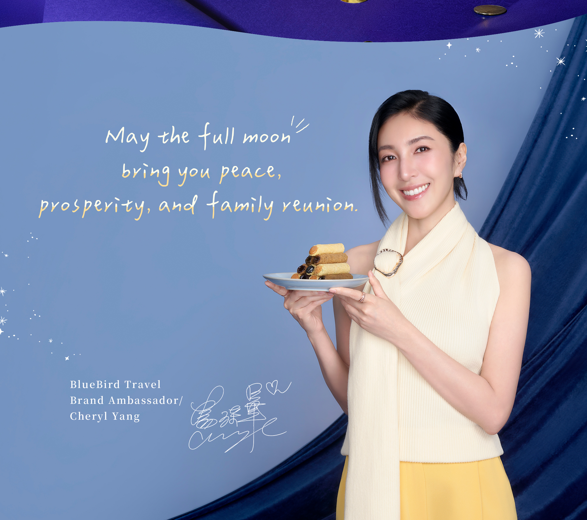 Cheryl Yang holding filled egg rolls with Mid-Autumn wishes.