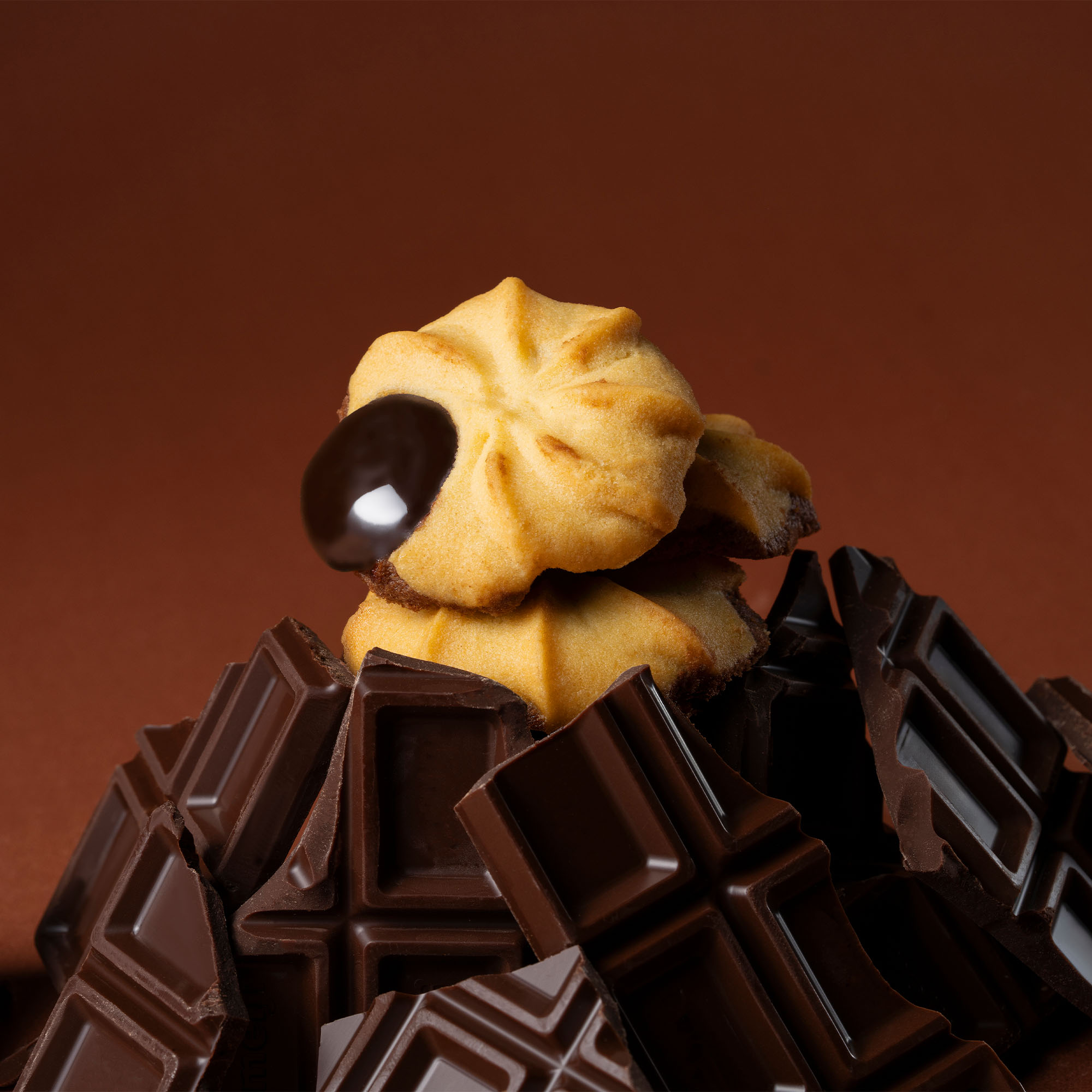 Dark chocolate filled butter cookies with a smooth chocolate centre.