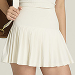 W MIDTOWN TENNIS SKIRT SANDRIFT