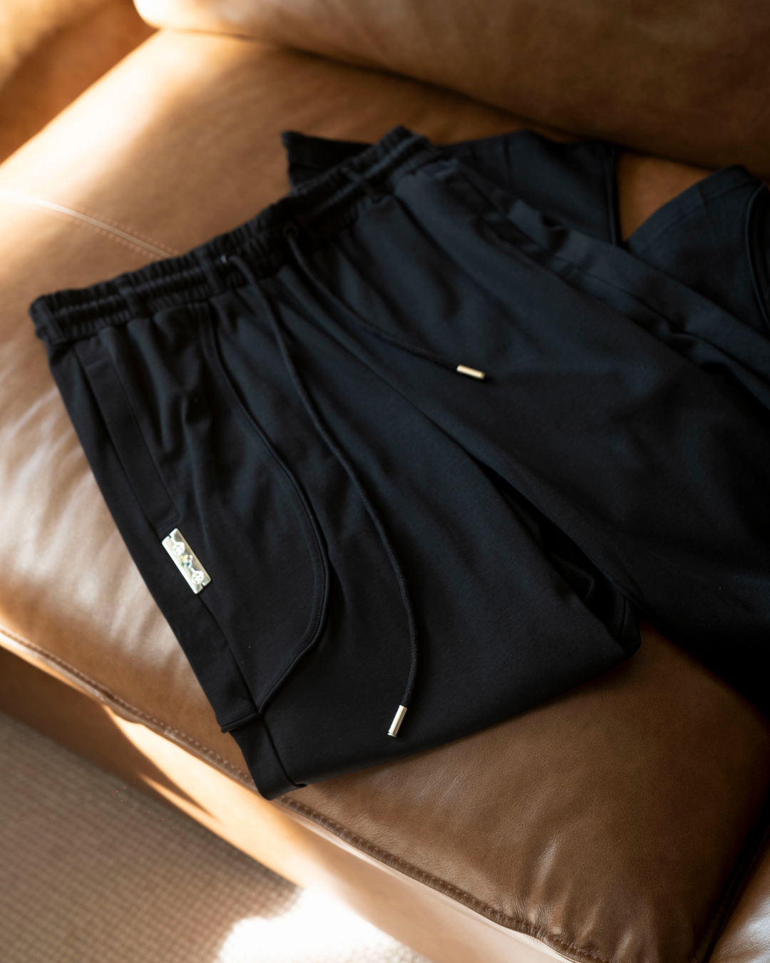 RIDING THE WAVE FORMAL SWEATPANTS IN SABLE (BLACK)