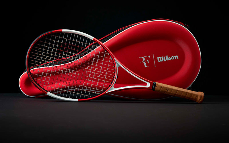 A red version of the RF racket with a RF racket bag