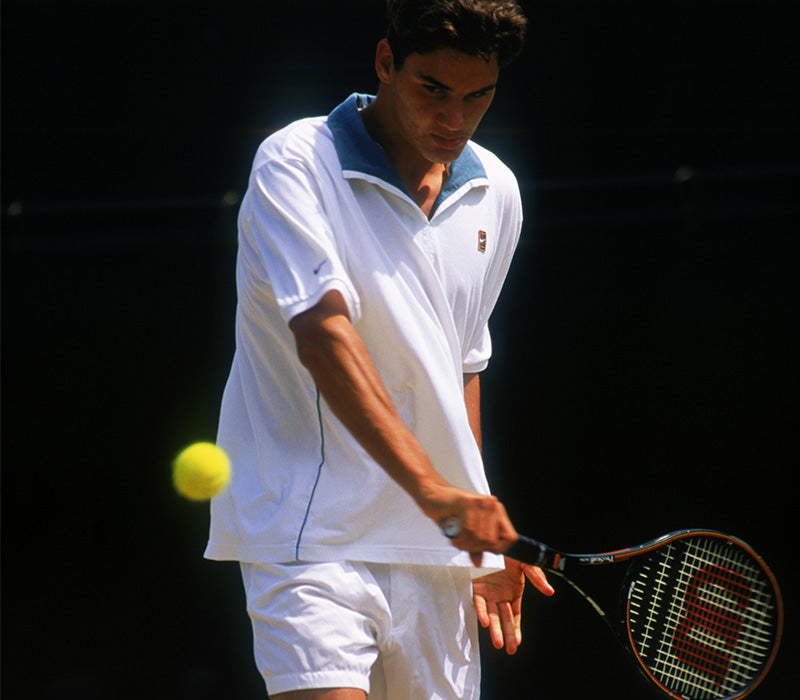 Roger Federer hitting a ball