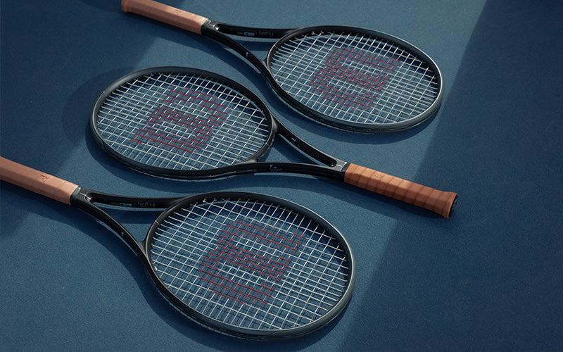 The RF01 racket iterations, laid out in alternating pattern on a blue background