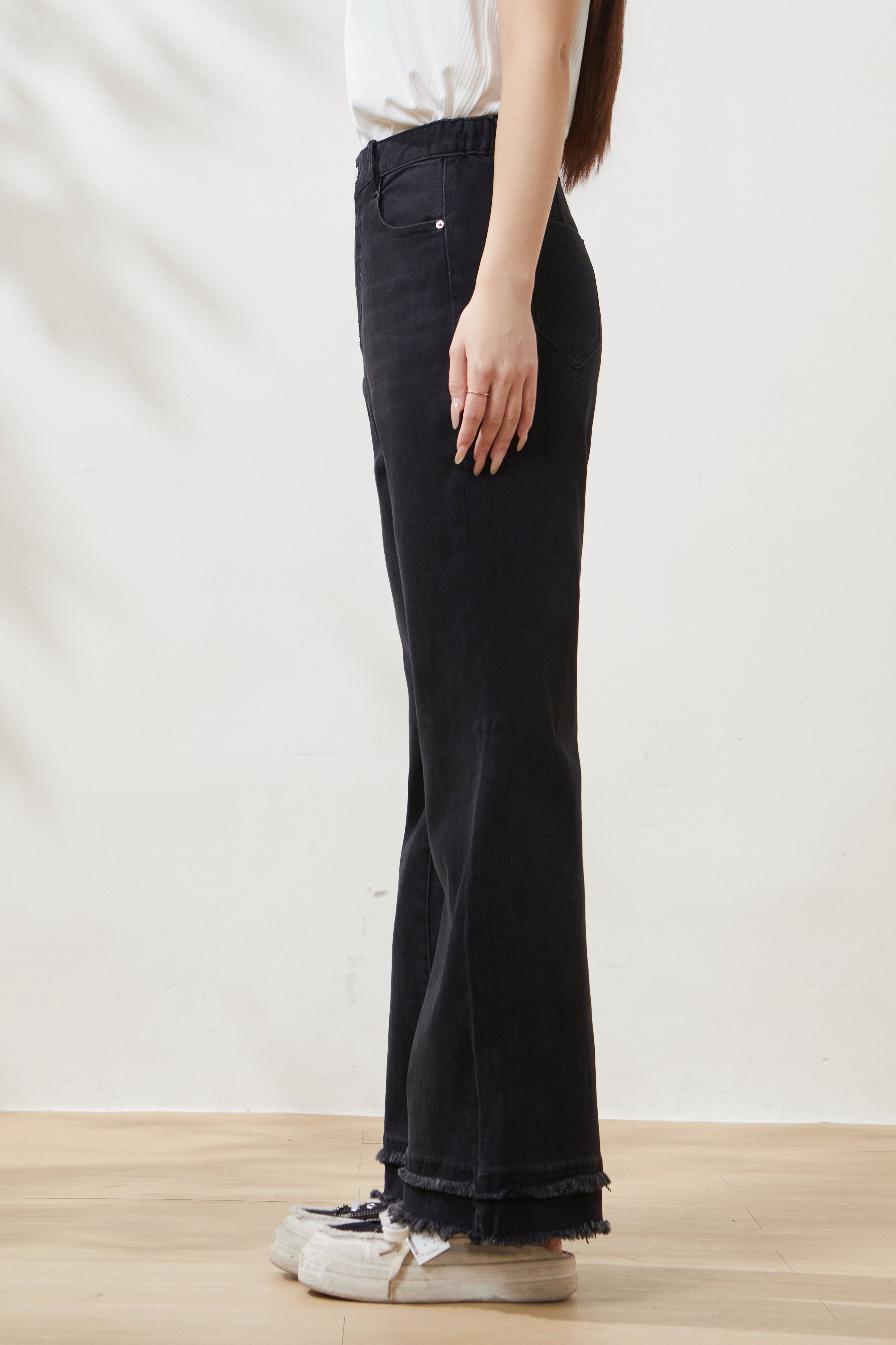 High-waisted flared jeans with frayed hem FCK6960