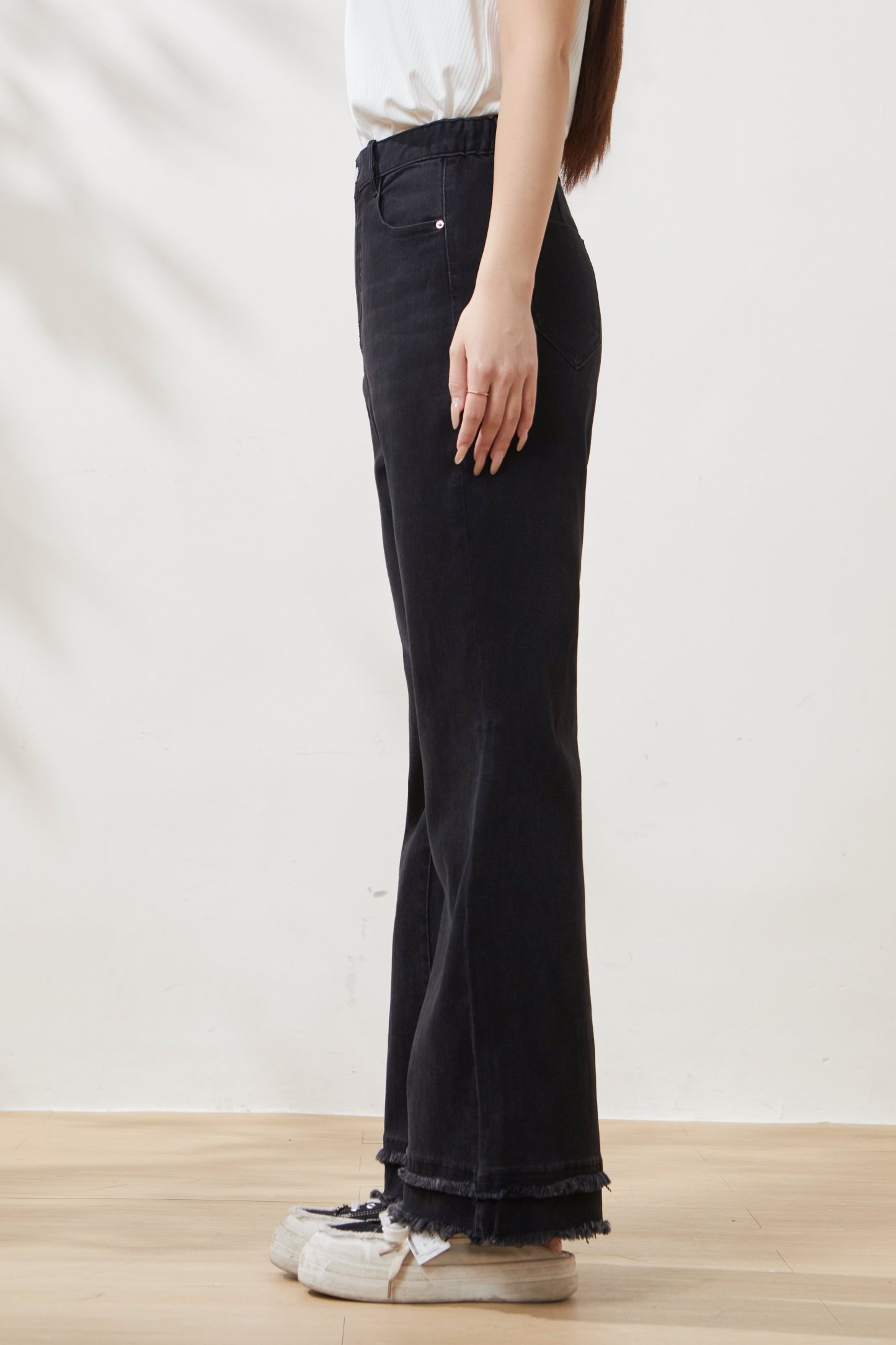 High-waisted flared jeans with frayed hem FCK6960