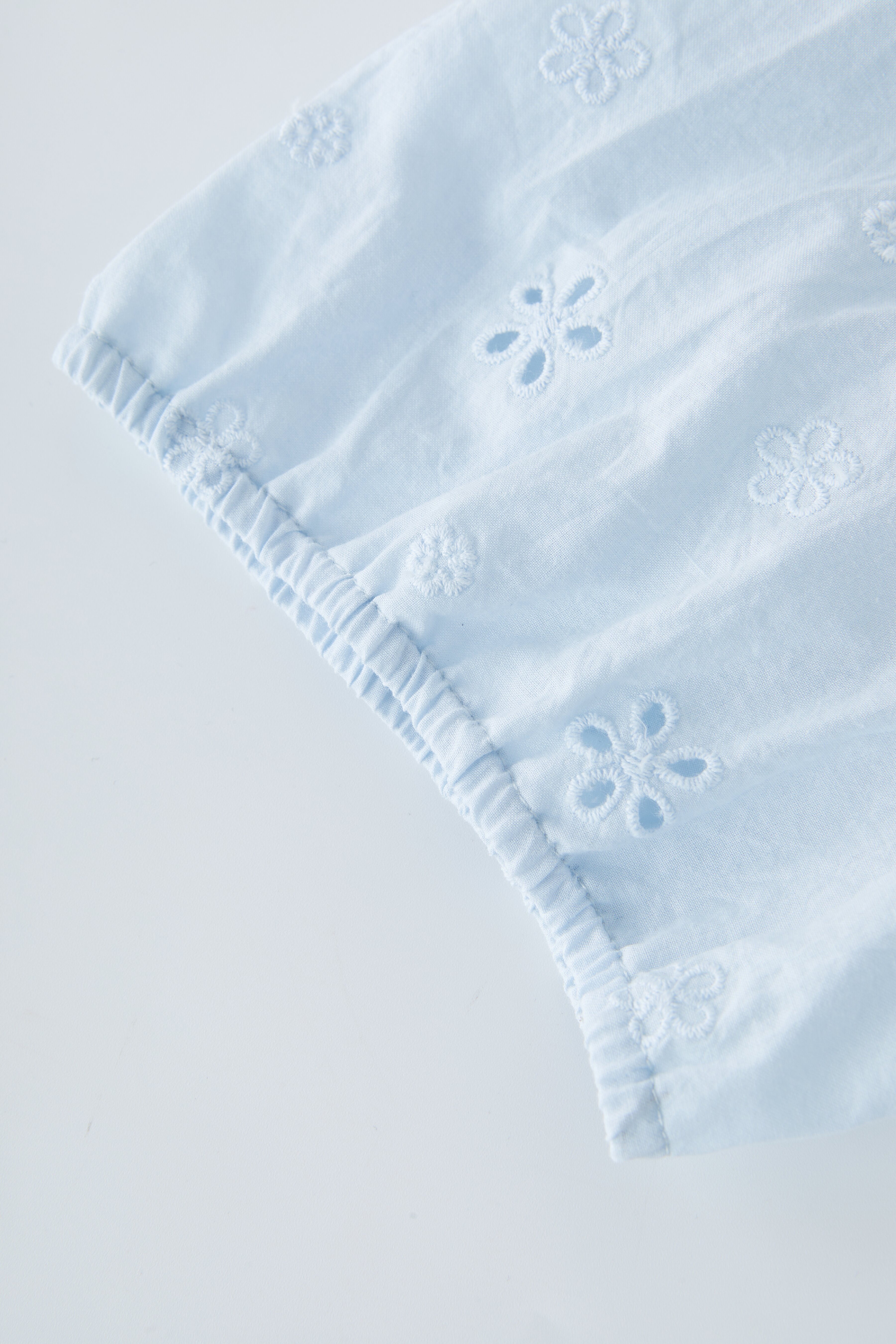 Embroidered Hollow Slimming Top EXA5307