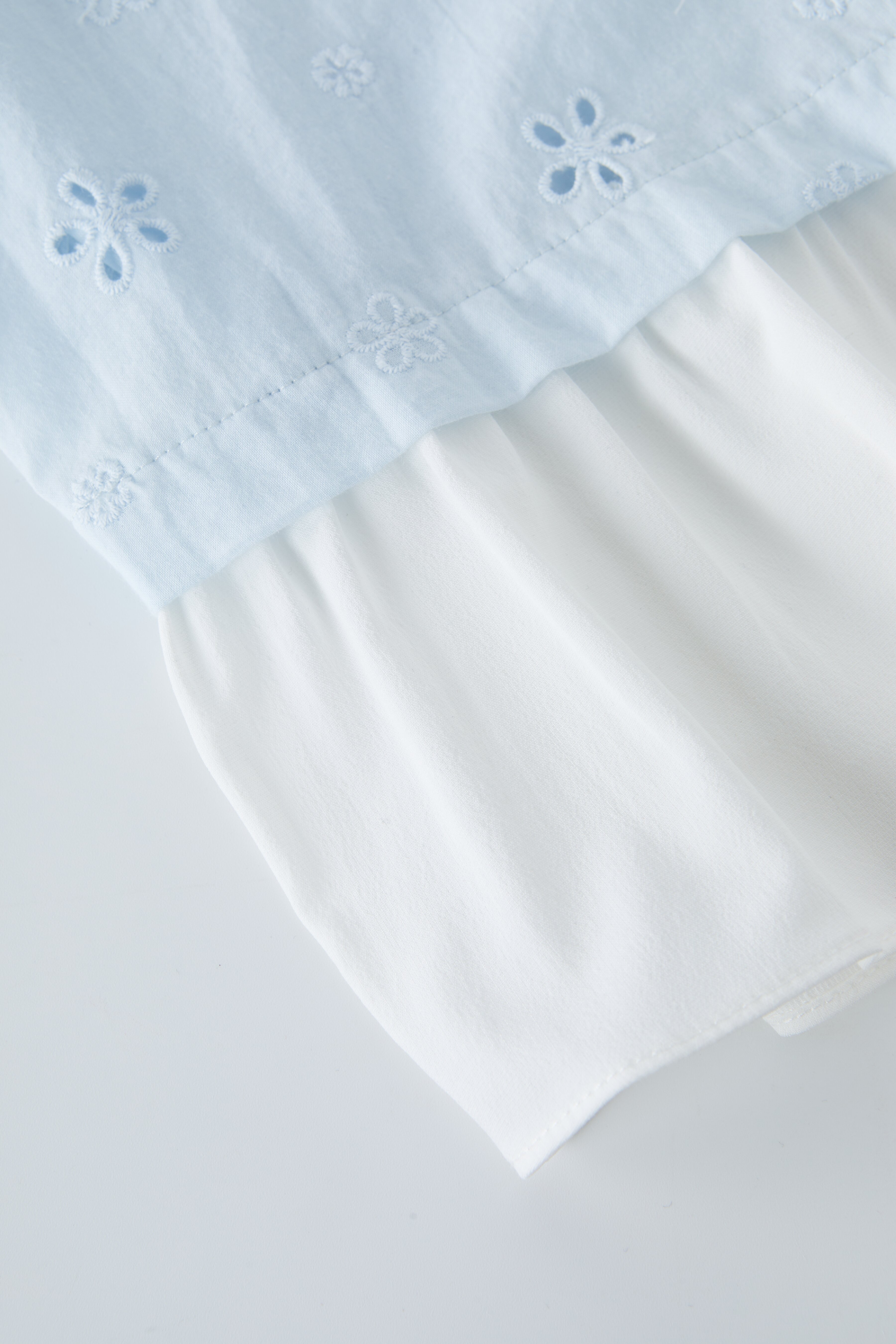 Embroidered Hollow Slimming Top EXA5307