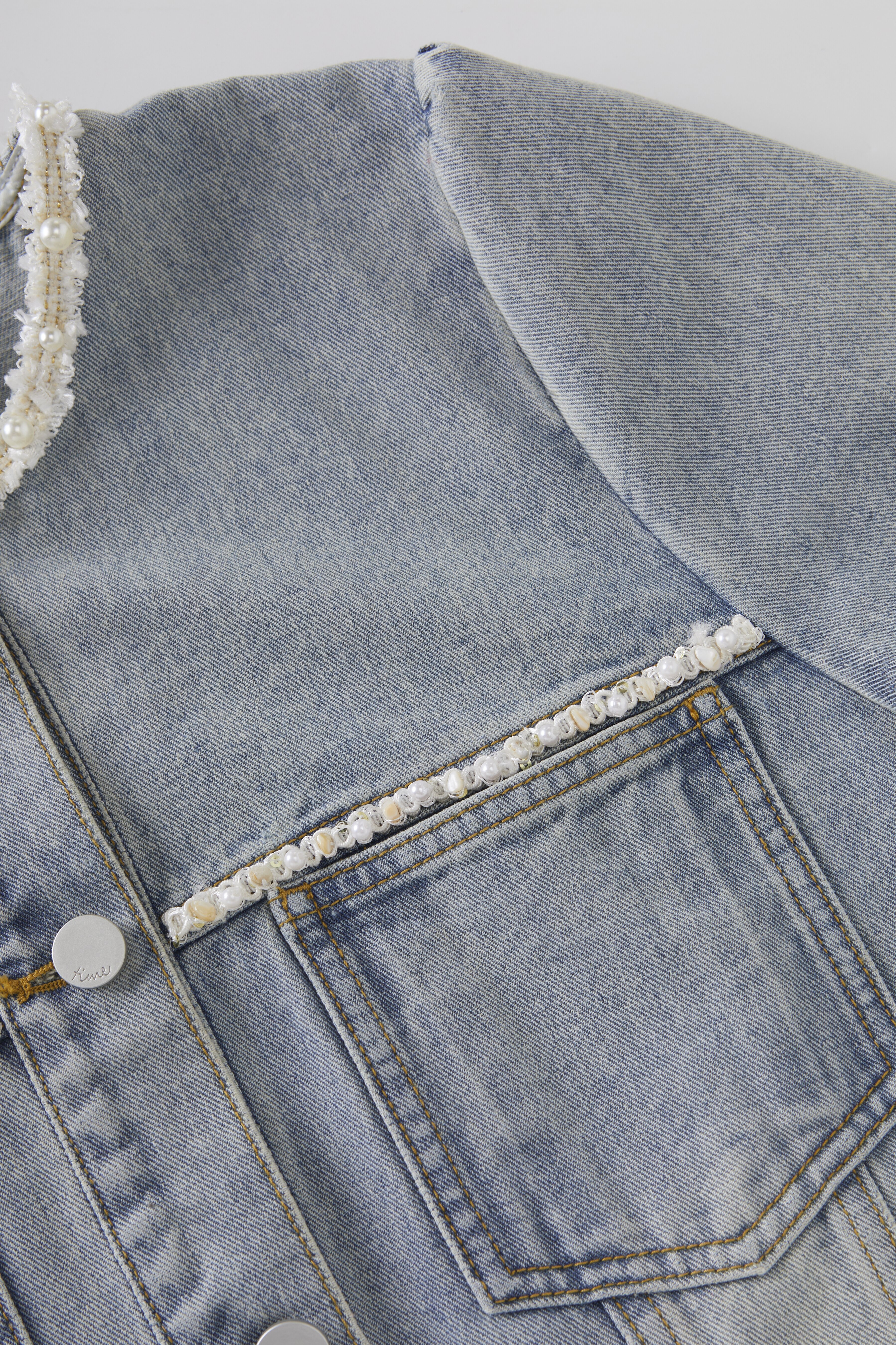 Mid-sleeve youthful denim jacket with pearl embellishments FCW8009