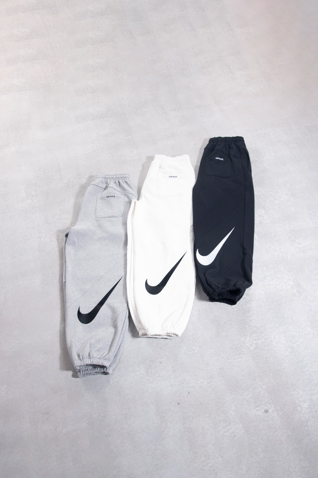 NIKE联名SUPREME束脚加绒长裤