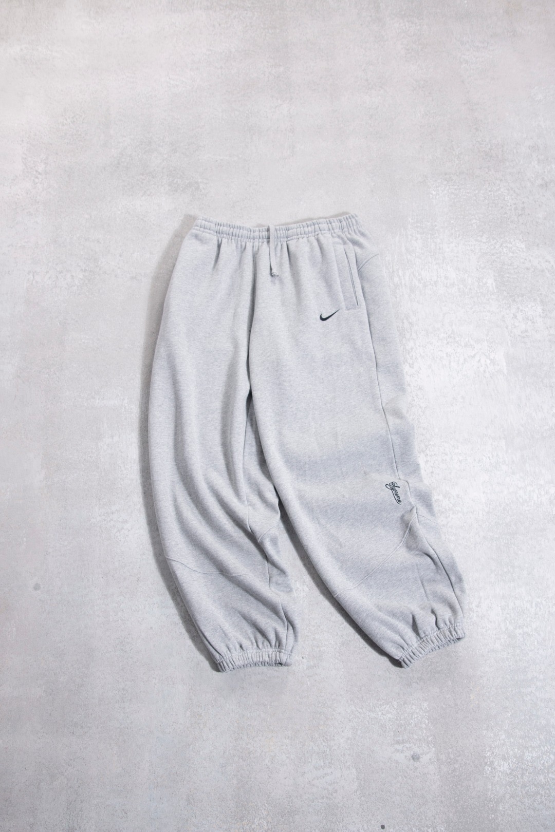 NIKE联名SUPREME束脚加绒长裤