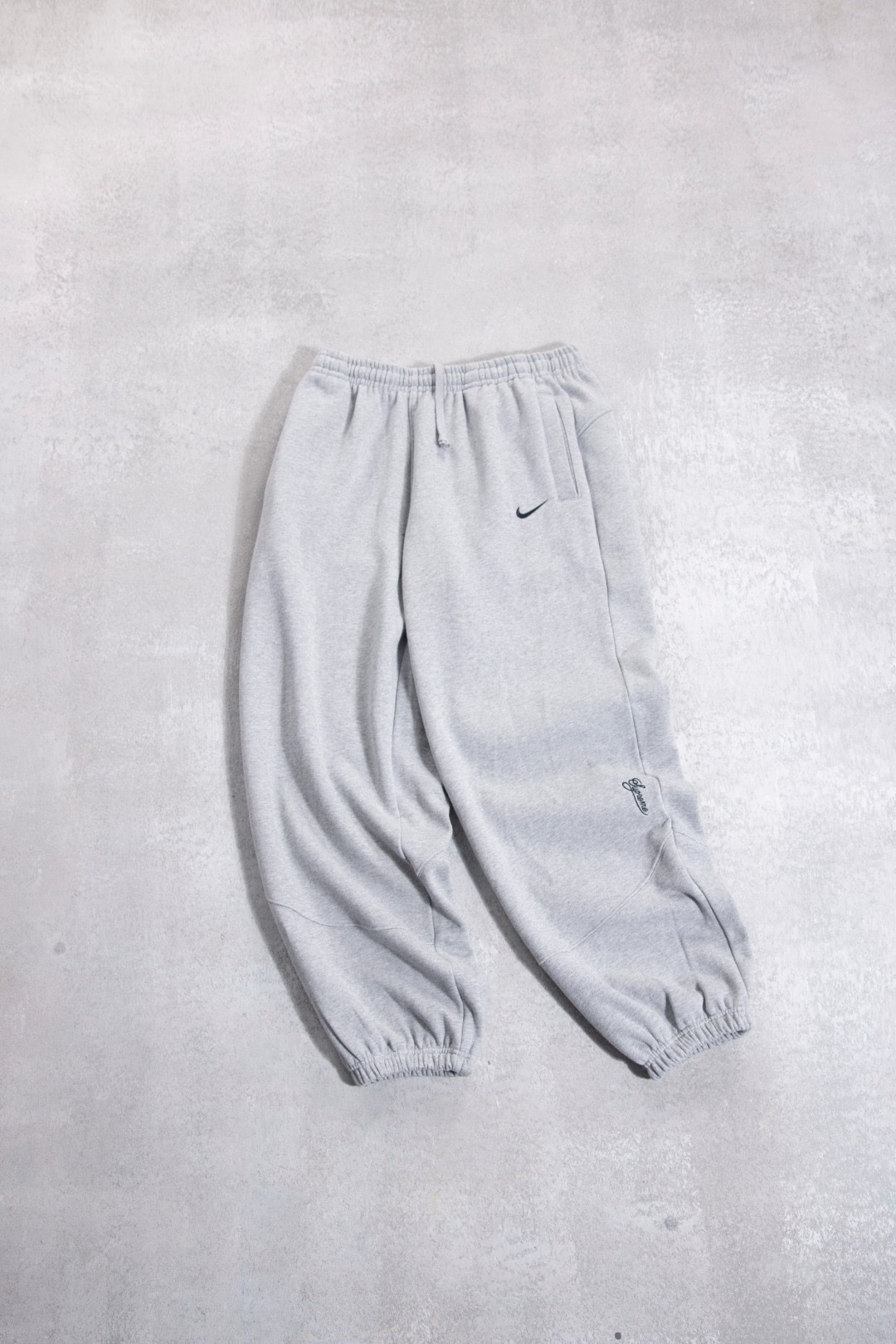 NIKE联名SUPREME束脚加绒长裤