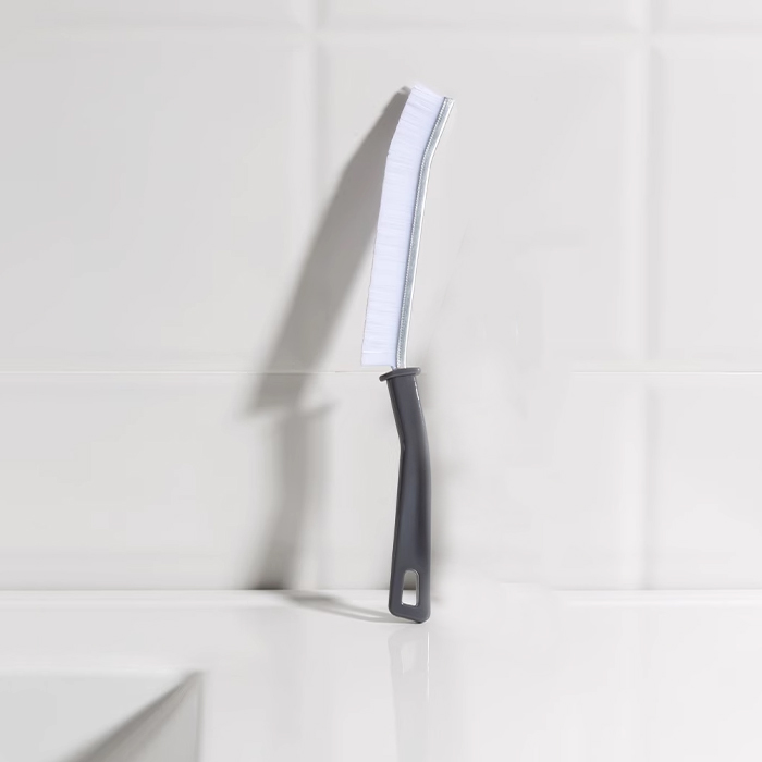 Narrow seam cleaning brush