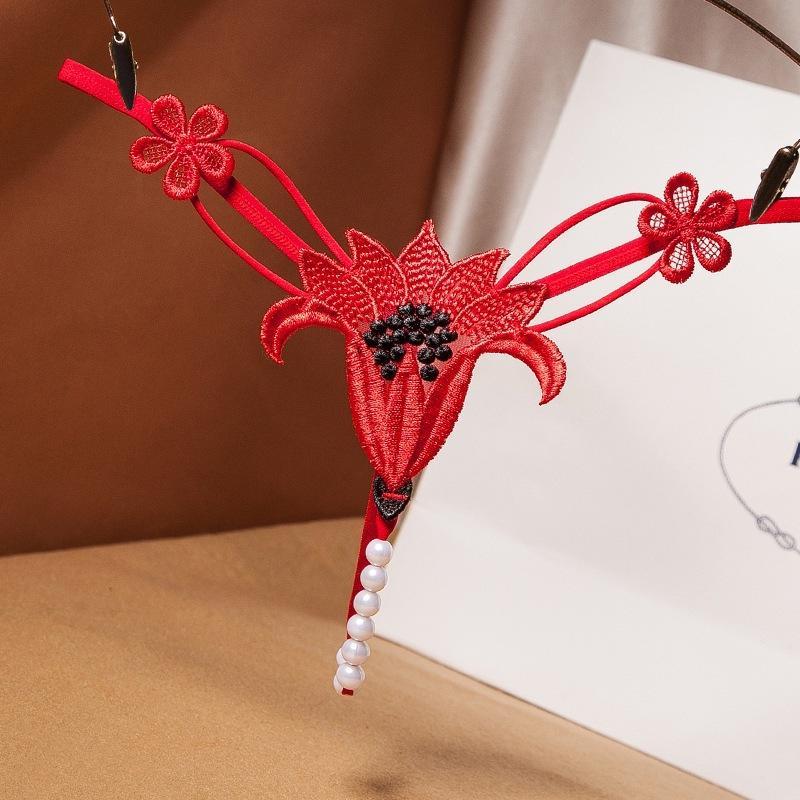 パール付きtバックショーツ - ローライズ エロティックな誘惑パンティ フラワービーズ装飾 フリーサイズ - FaceBoxer