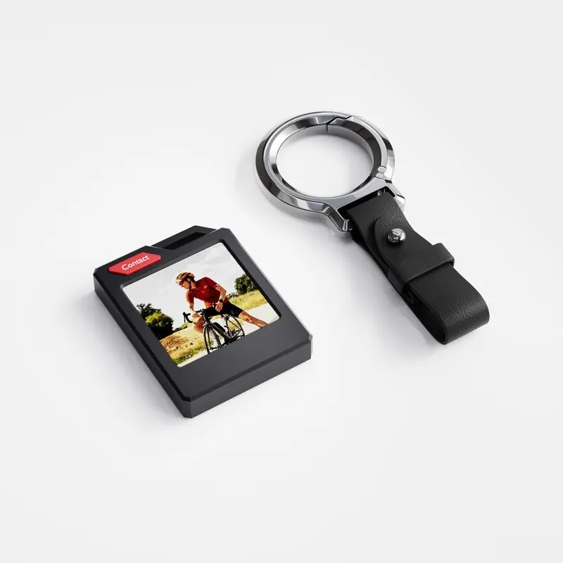 Customizable e-ink tracker(with Keychain) for keys, wallets, luggage Compatible with Apple Find My (iOS only). Displays Photos Up to 10 months of battery life and IP65 waterproof Replaceable Battery.