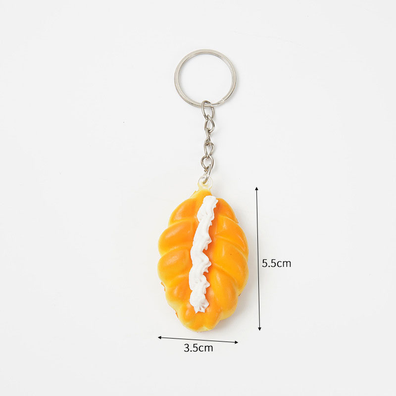 Mini Realistic Cream-Filled Bread PU Foam Squishy Stress Relief Toy Cute Bag Charm & Keychain - MyFaceBoxer