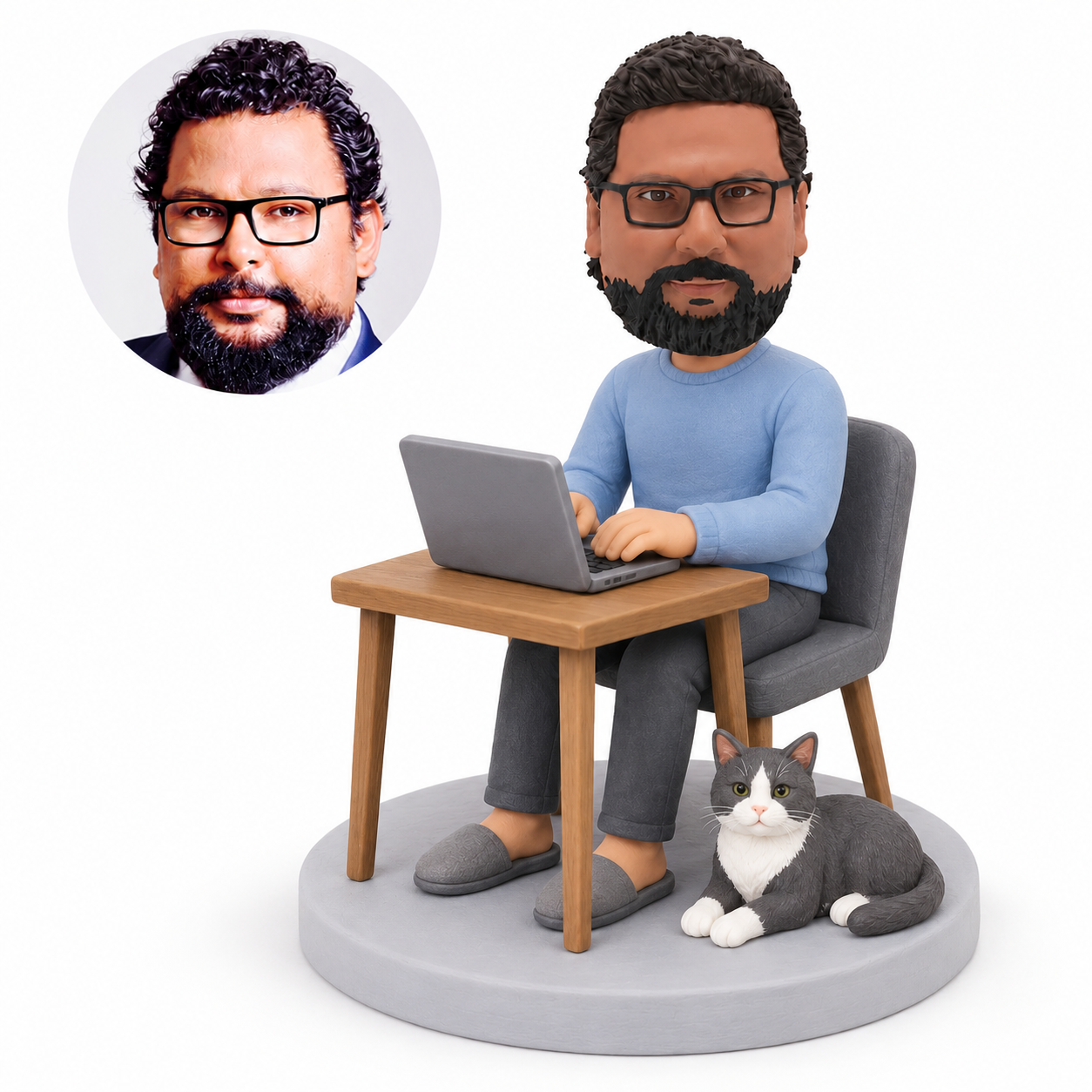 custom bobblehead figure man working at a laptop beside a cat