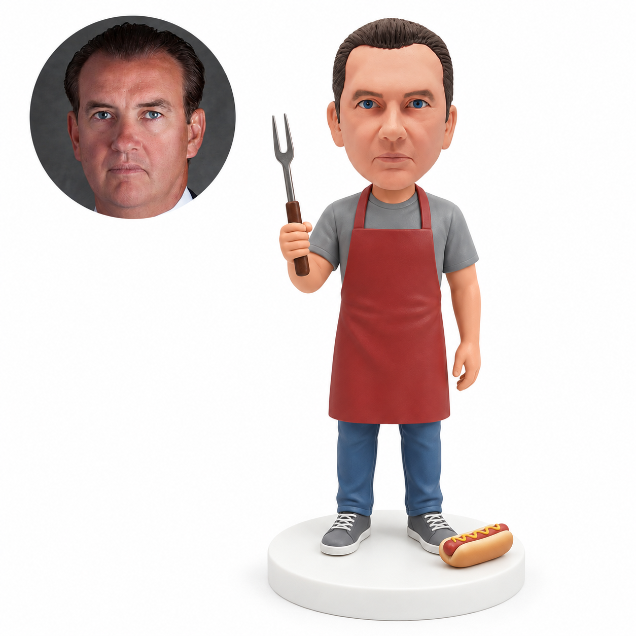 custom bobblehead figure man in an apron holding a barbecue fork beside a hot dog
