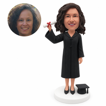 custom bobblehead figure female graduate holding a diploma beside her head with a graduation cap on the base