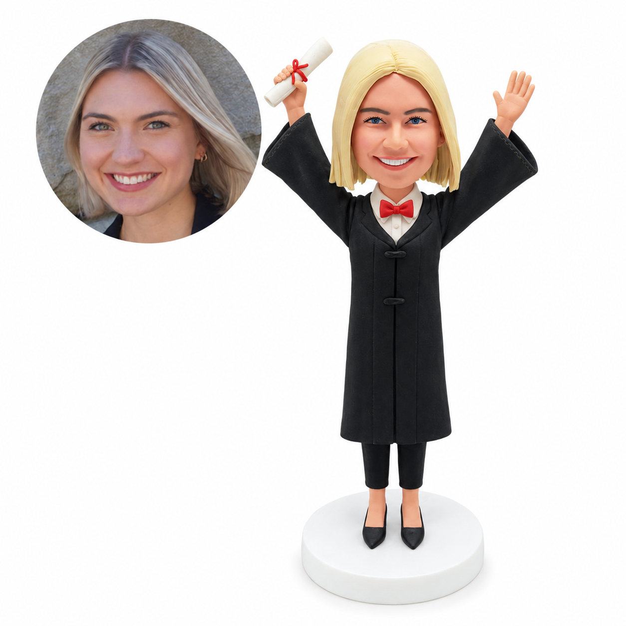 custom bobblehead figure female graduate in a long-sleeve academic gown with a bow tie raising both arms and a diploma