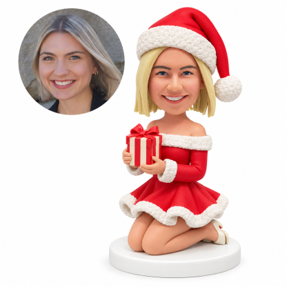 custom bobblehead figure Santa woman kneeling with a gift box