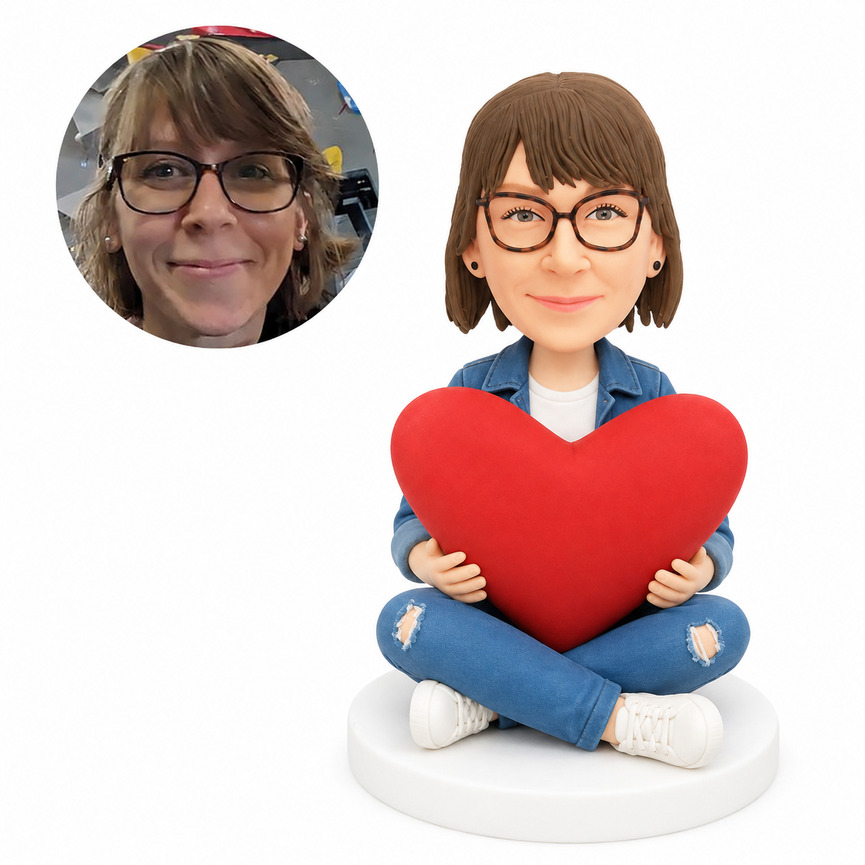custom bobblehead figure woman sitting cross-legged holding a large heart