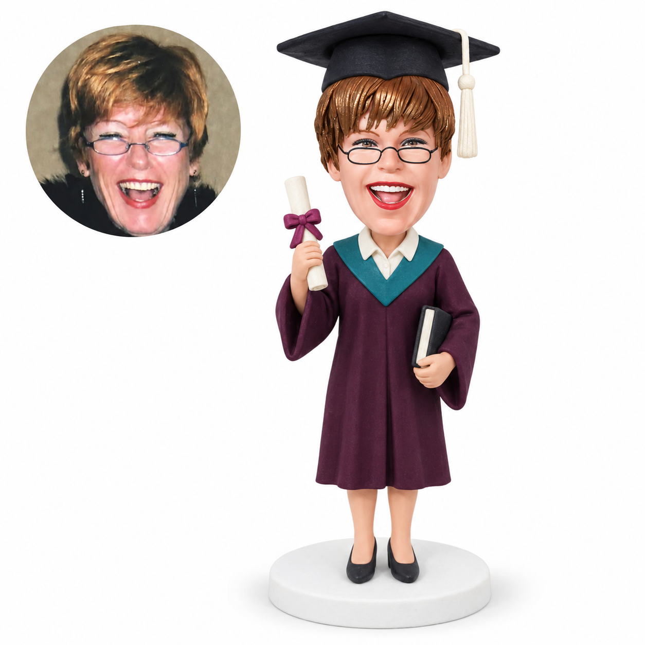 custom bobblehead figure female graduate holding a diploma beside her shoulder and a book at her hip