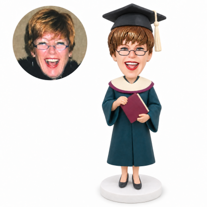 custom bobblehead figure female graduate with a round academic cape holding a diploma book