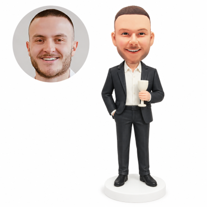 custom bobblehead figure man in a suit holding a stemmed celebration glass with a hand in his pocket