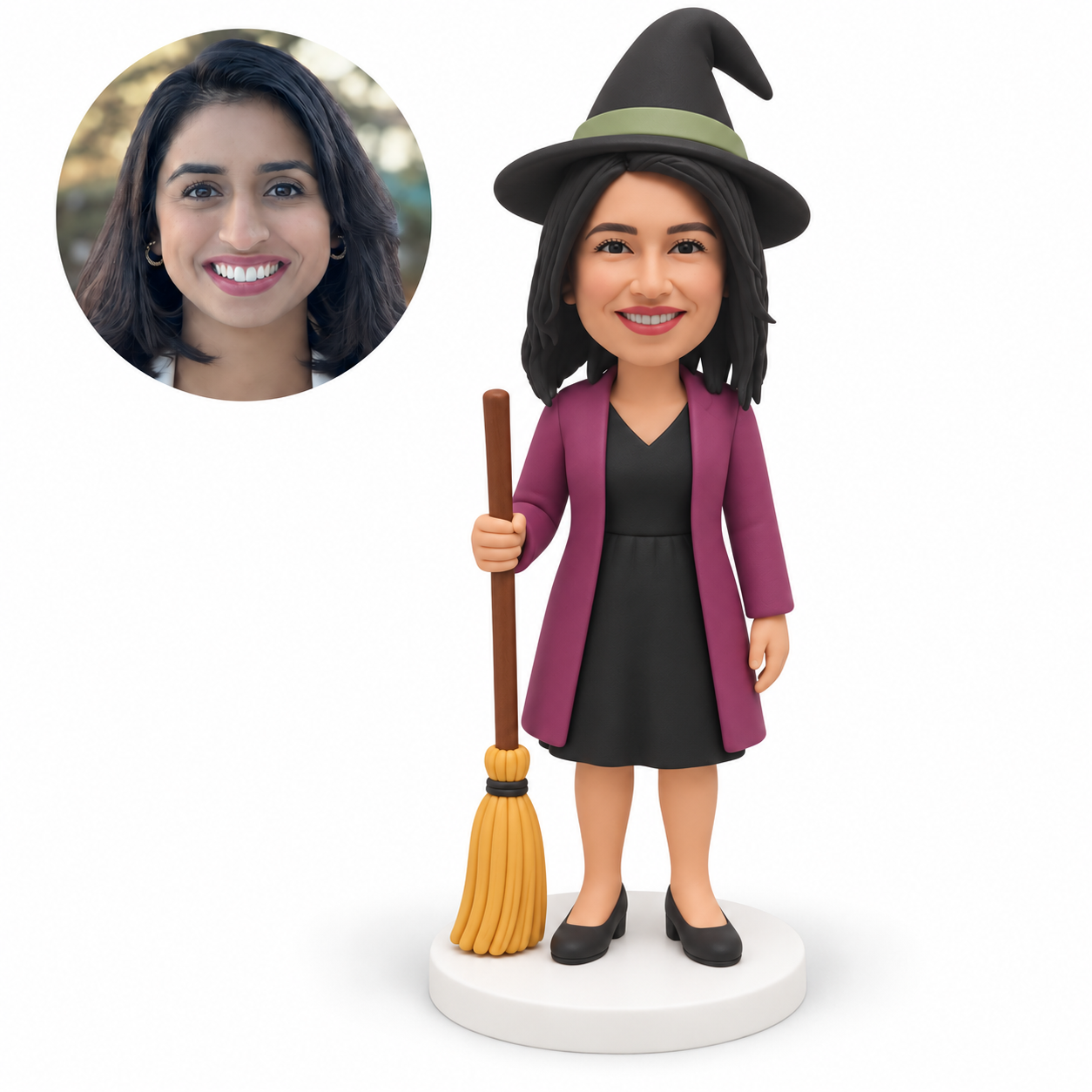 custom bobblehead figure woman in a witch dress and long jacket holding an upright broom