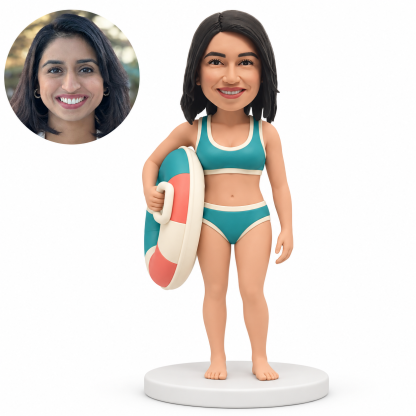 custom bobblehead figure woman in a bikini holding an upright swim ring at her side