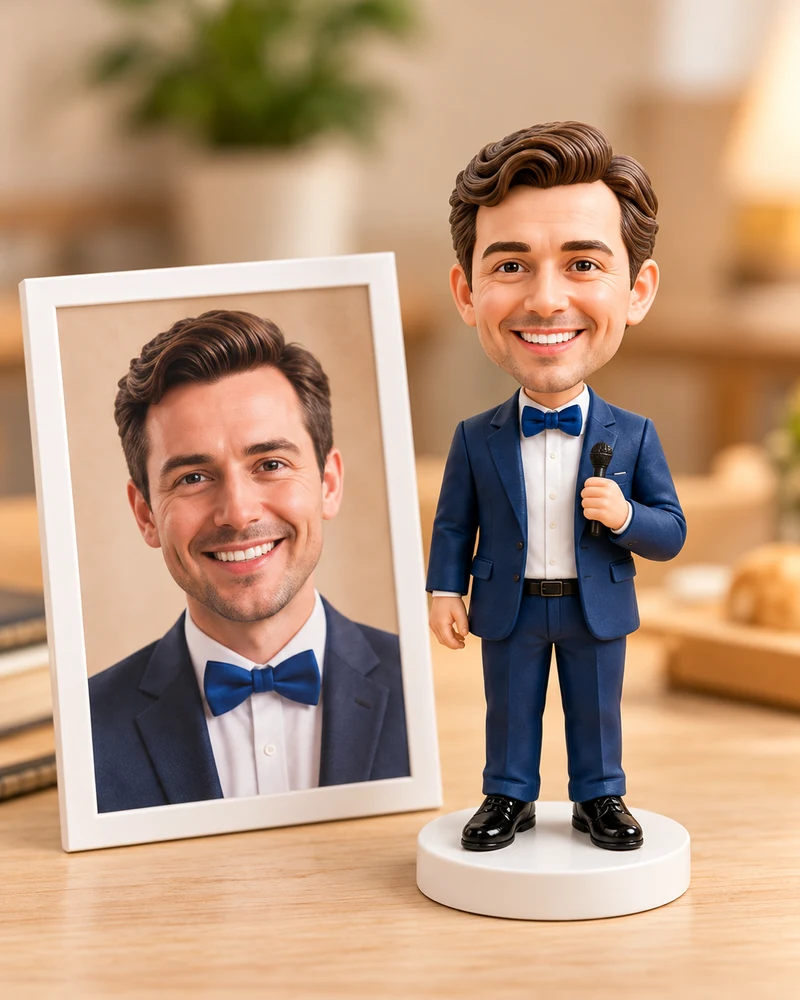 A portrait beside its matching navy-suited custom bobblehead.