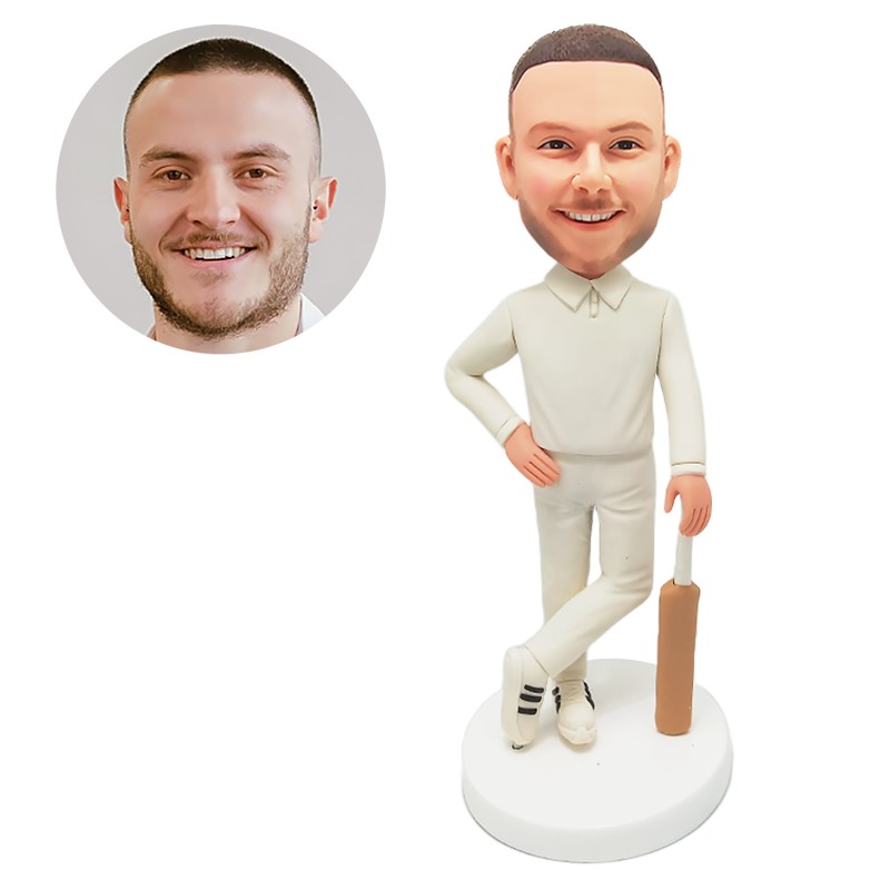 bobblehead custom man holding a cricket bat