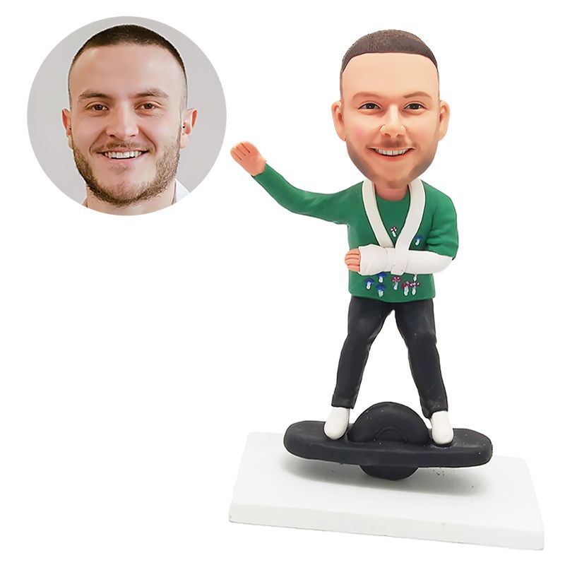 custom bobblehead man with a broken hand skateboarding