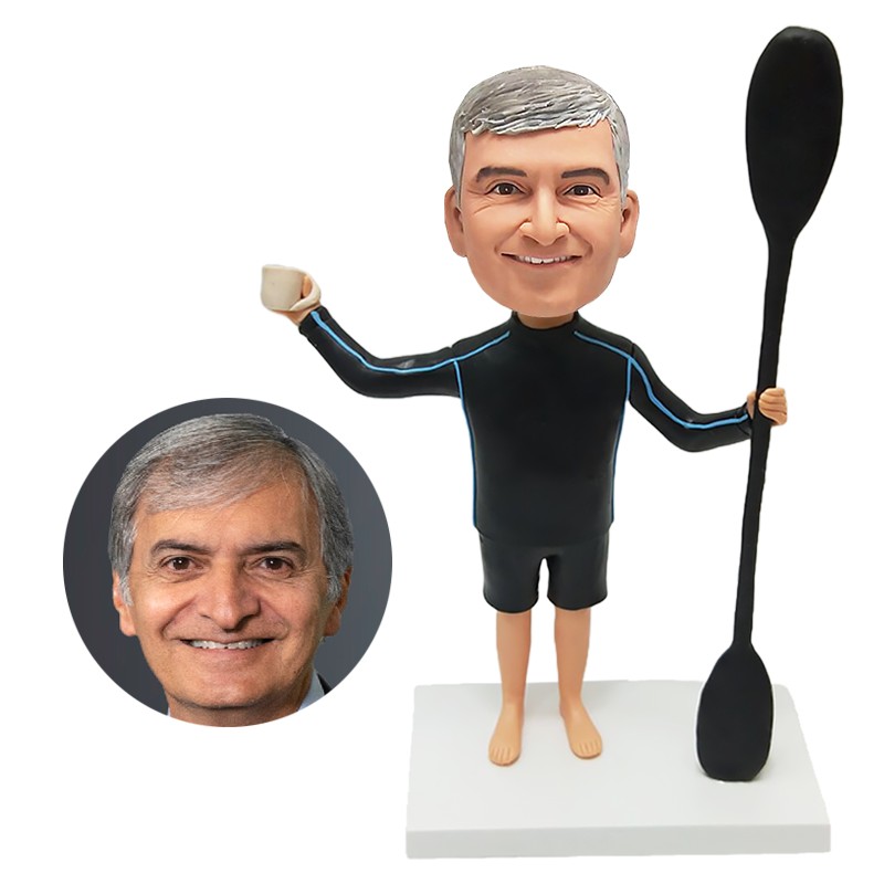 custom bobble head player holding a oar