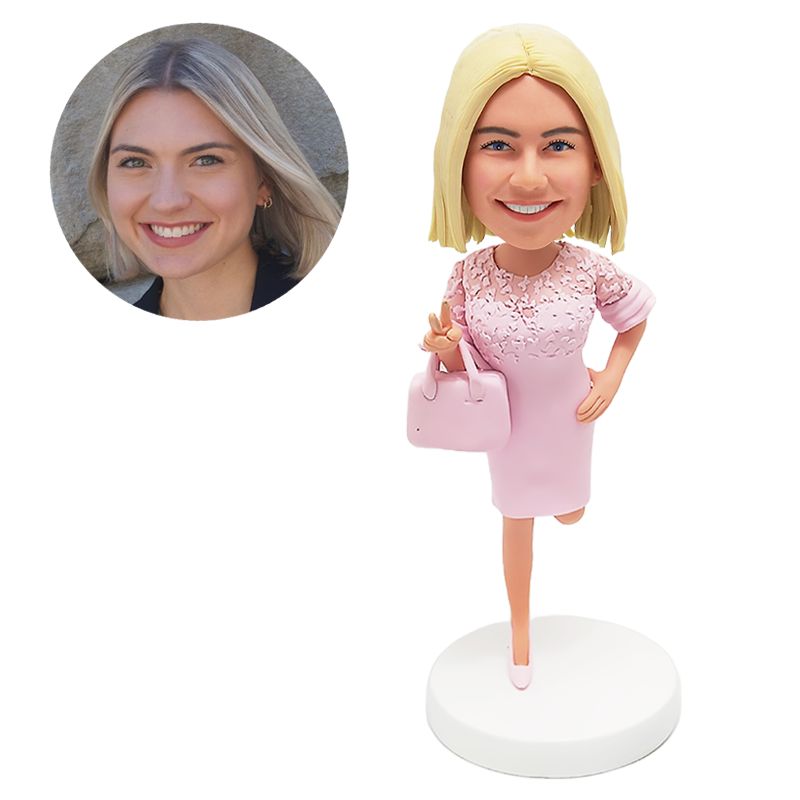 bobblehead custom pretty lady holding a bag making yeah gesture